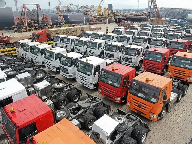 A group of kales trucks parked at the port, waiting for export.