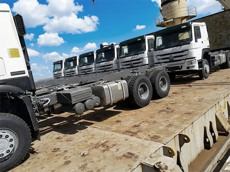 A group of kales trucks parked at the port, waiting for export.