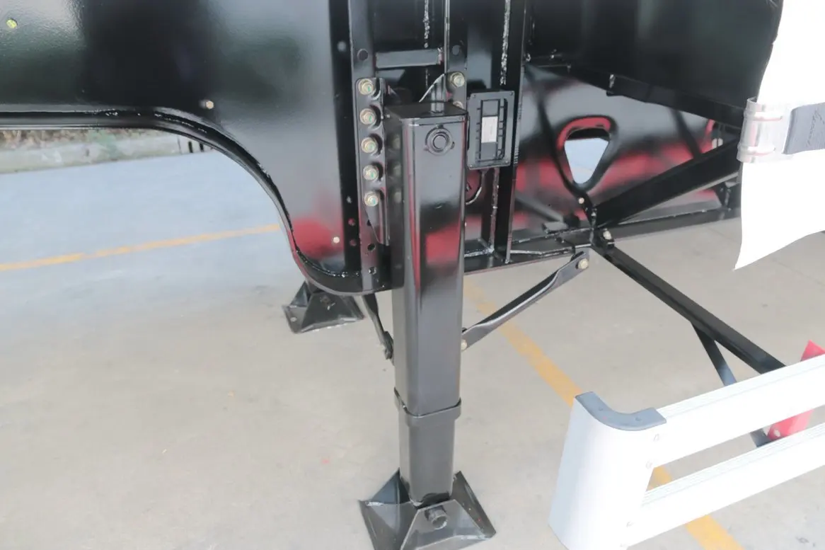 Detail of JOST brand landing gear on Kales 13M Curtainsider semi-trailer.