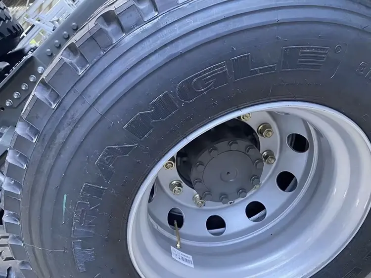 Brand new 12.00R20 tires and refurbished steel rims on Kales Vehicle HOWO truck.
