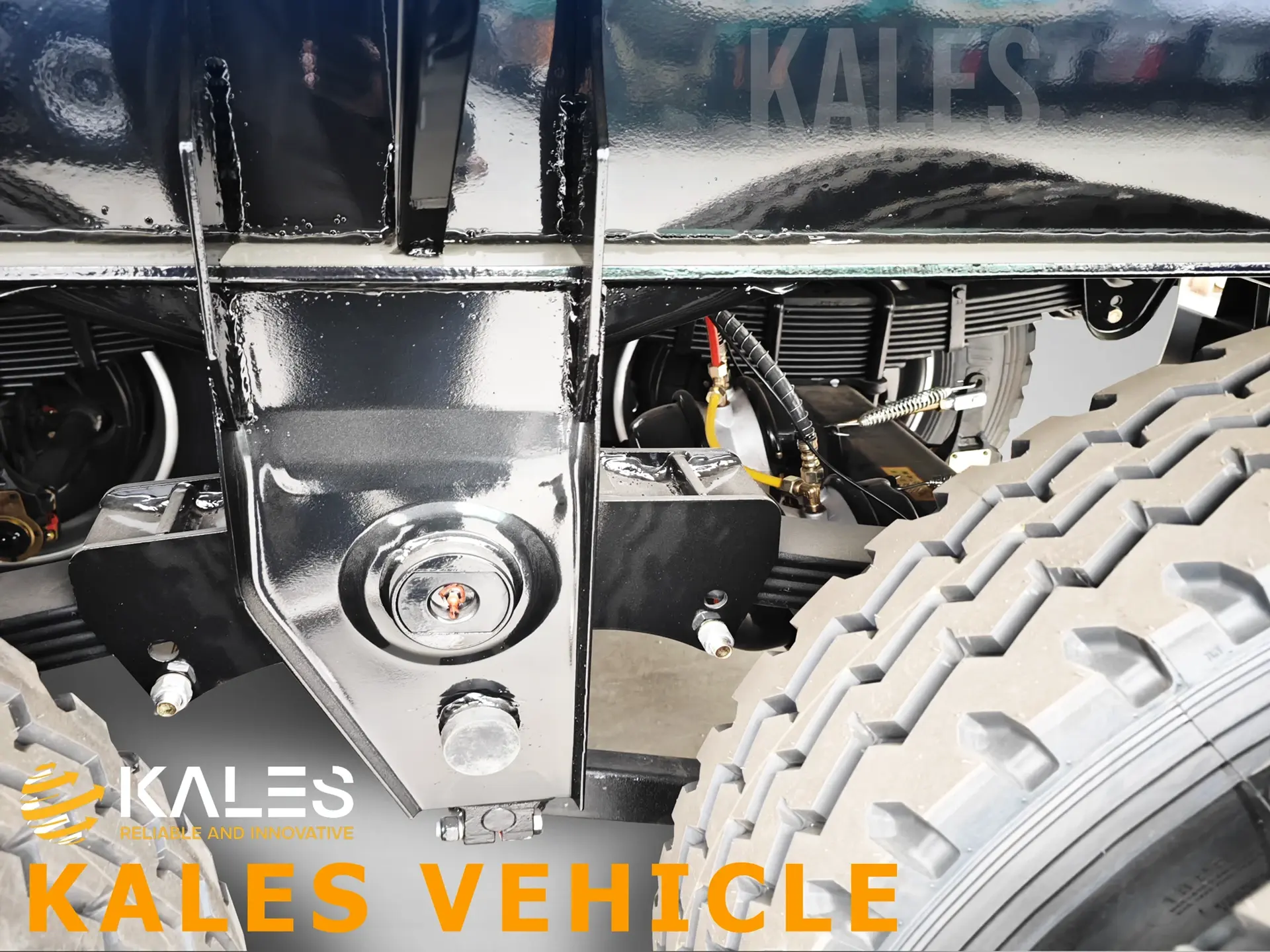 Heavy duty mechanical leaf spring suspension system designed for rough road conditions.